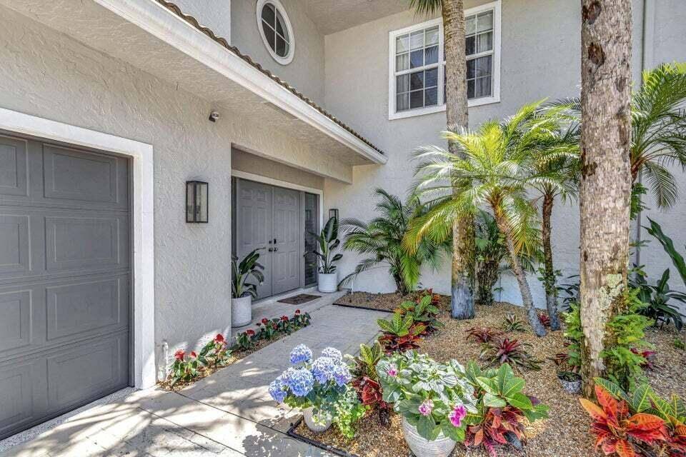 Nestled in the prestigious Palm Beach Polo Club, this exquisitely designed 4 bedroom, 3.