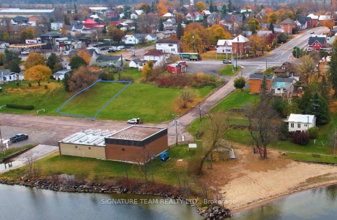 Waterview building lots overlooking Muskrat Lake boat launch and beach nearby.