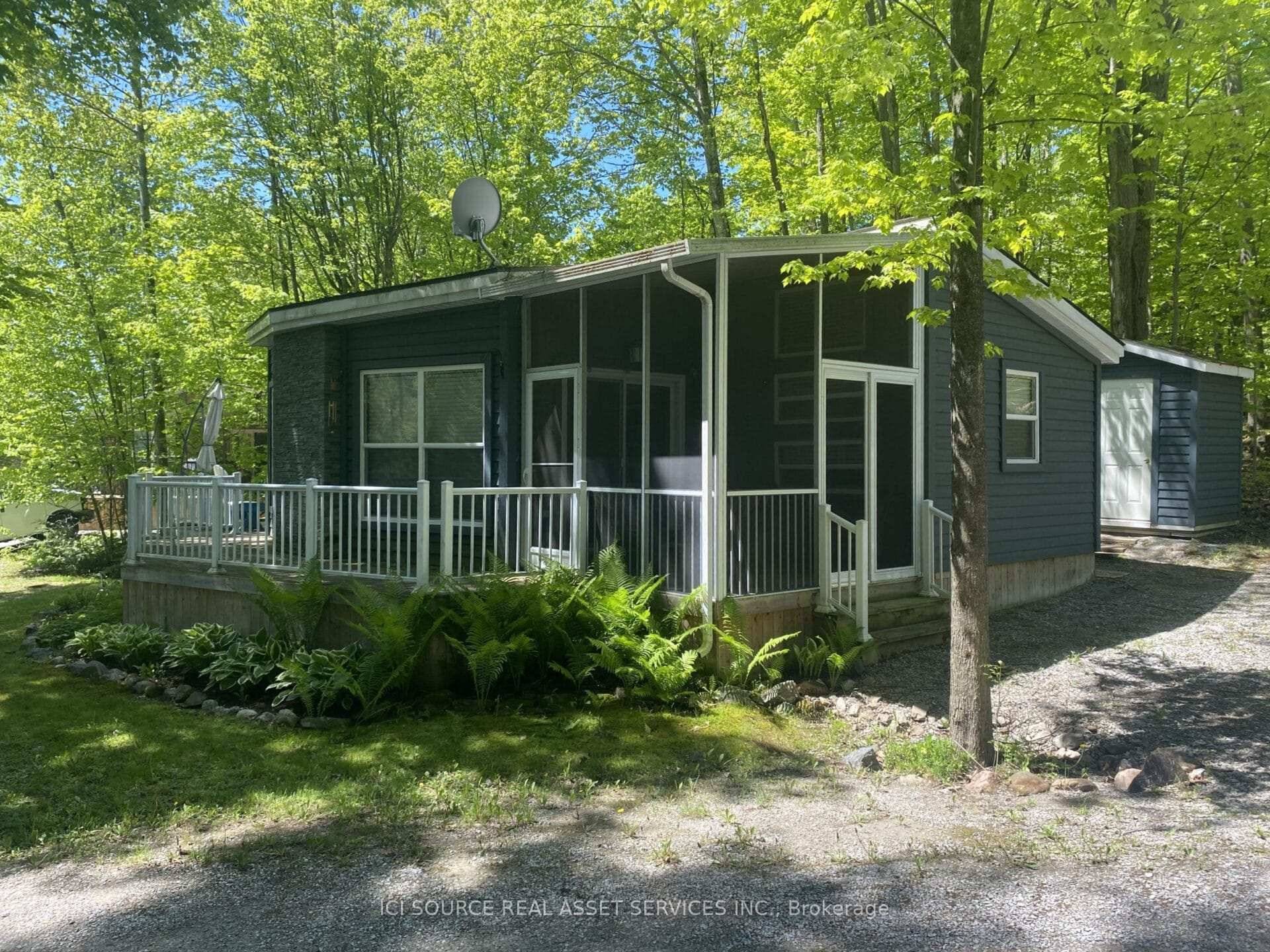 Discover this unique custom built resort cottage, perfectly positioned on a spacious private site overlooking serene green space.