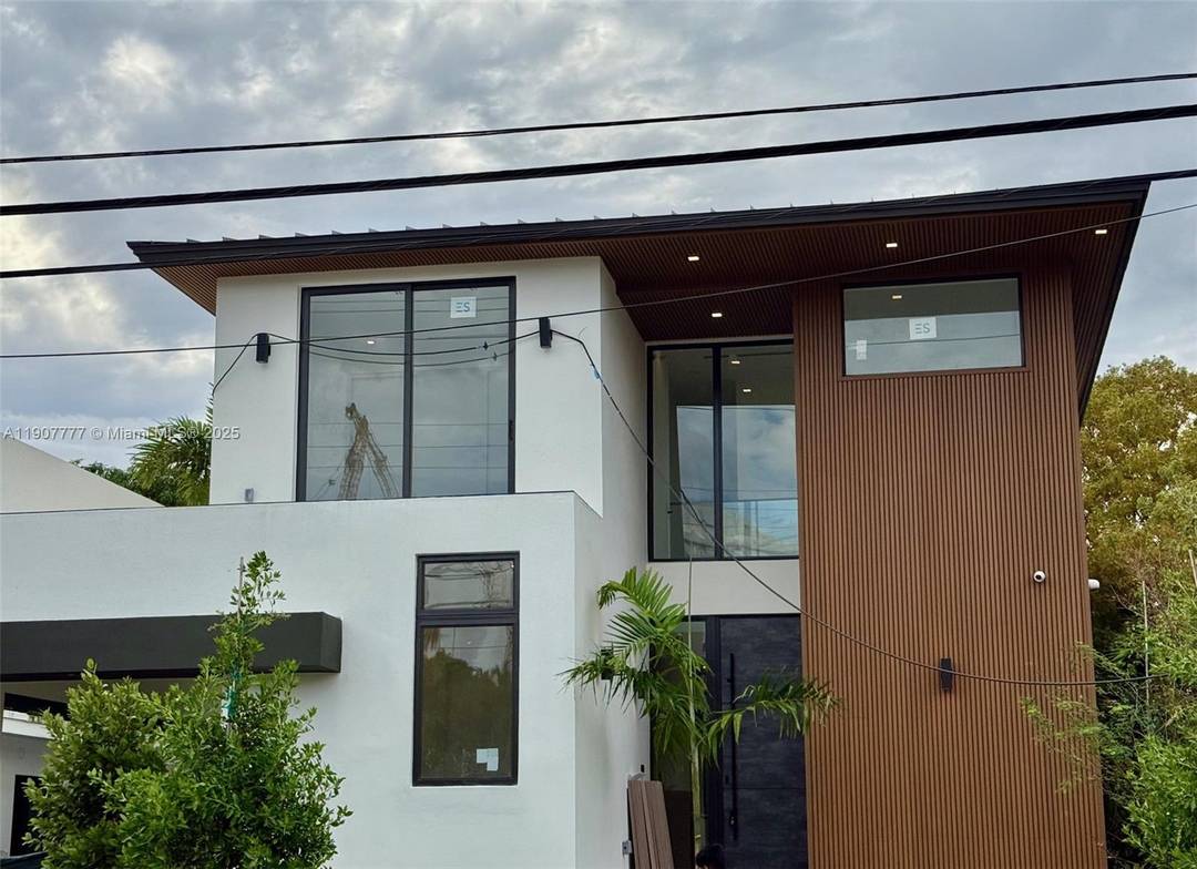 This brand new, exquisite two story residence is the epitome of modern luxury living.