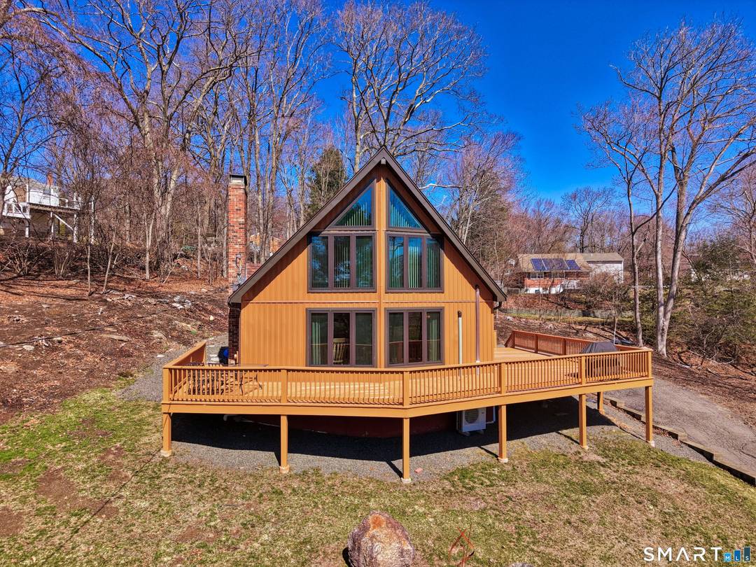 Tucked away on a quiet cul de sac, this contemporary chalet style home offers a peaceful retreat you'll love coming home to filled with warmth, character, and natural light you'll ...