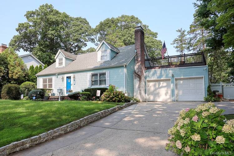 Welcome to this charming three bedroom, two bathroom home in the heart of Glen Head, offering comfortable living spaces, thoughtful updates, and wonderful outdoor amenities.