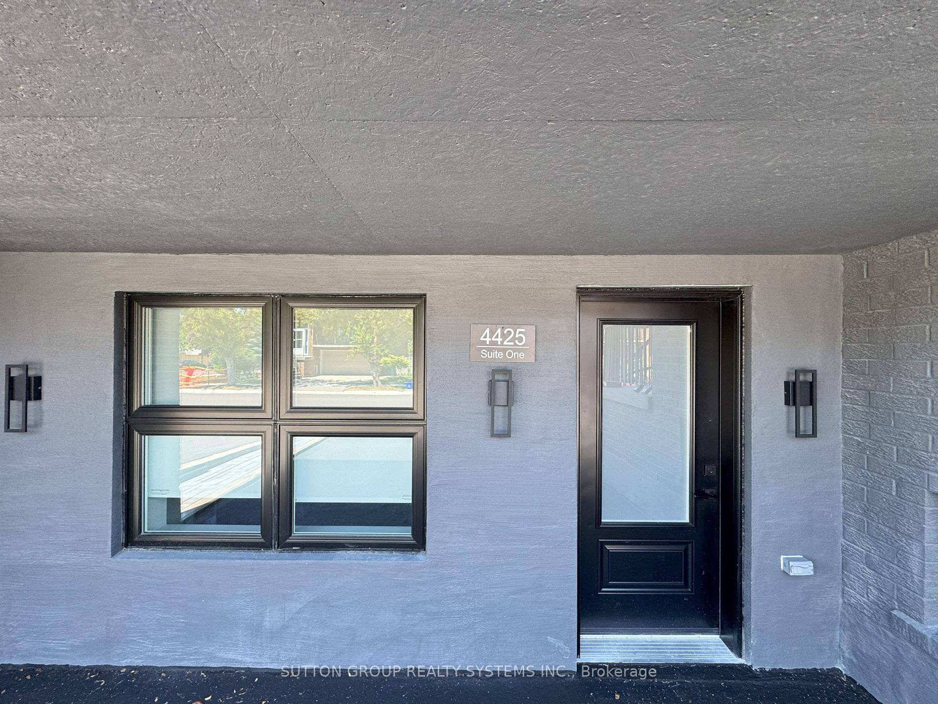 A MUST SEE ! This Meticulously Renovated Main Floor Unit, Nestled Within A Serene Low Rise Building Comprising Just Two Exclusive Residences.