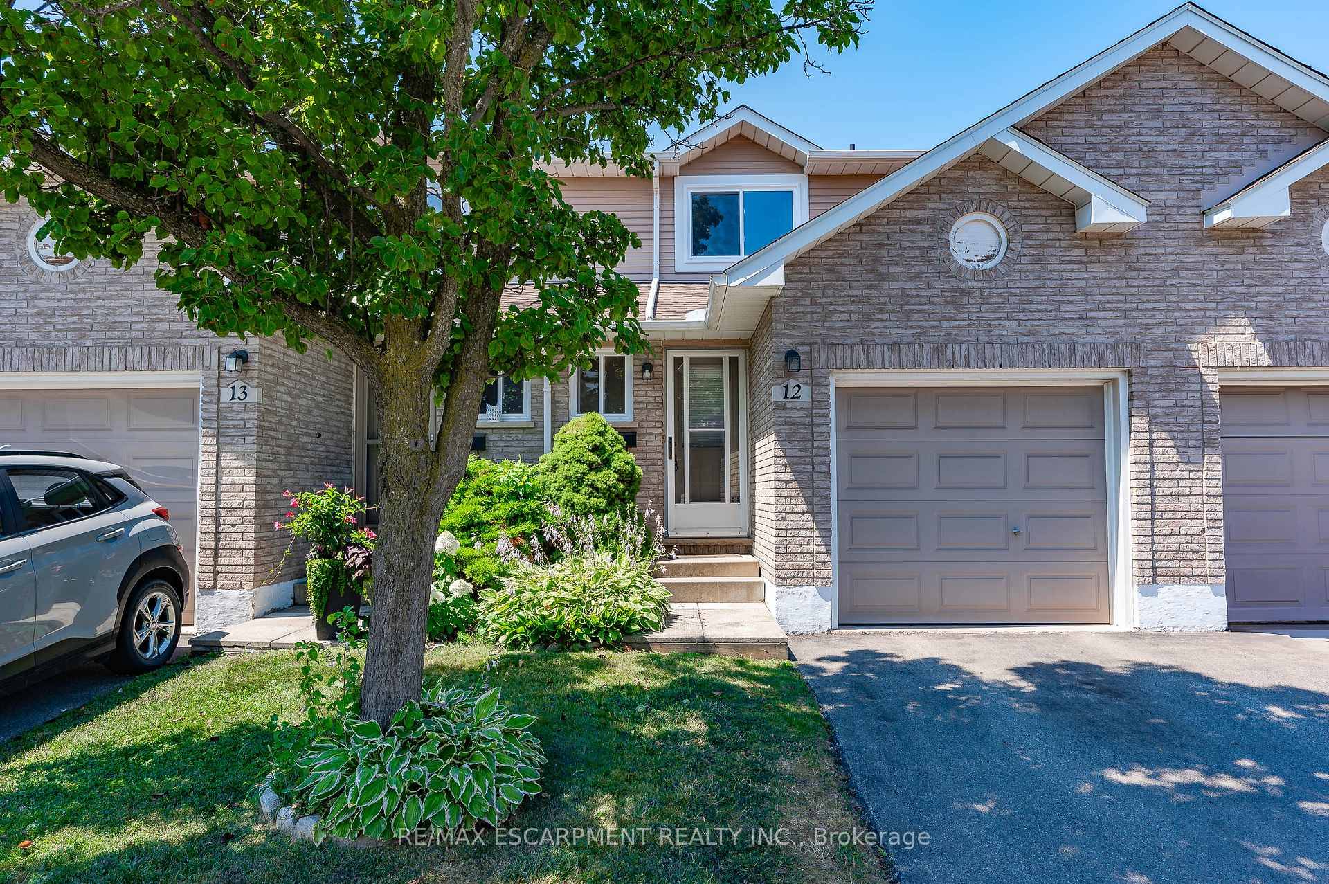 This wonderful Townhome is located in a small quiet community with mature trees, amp ; the complex is very well maintained.