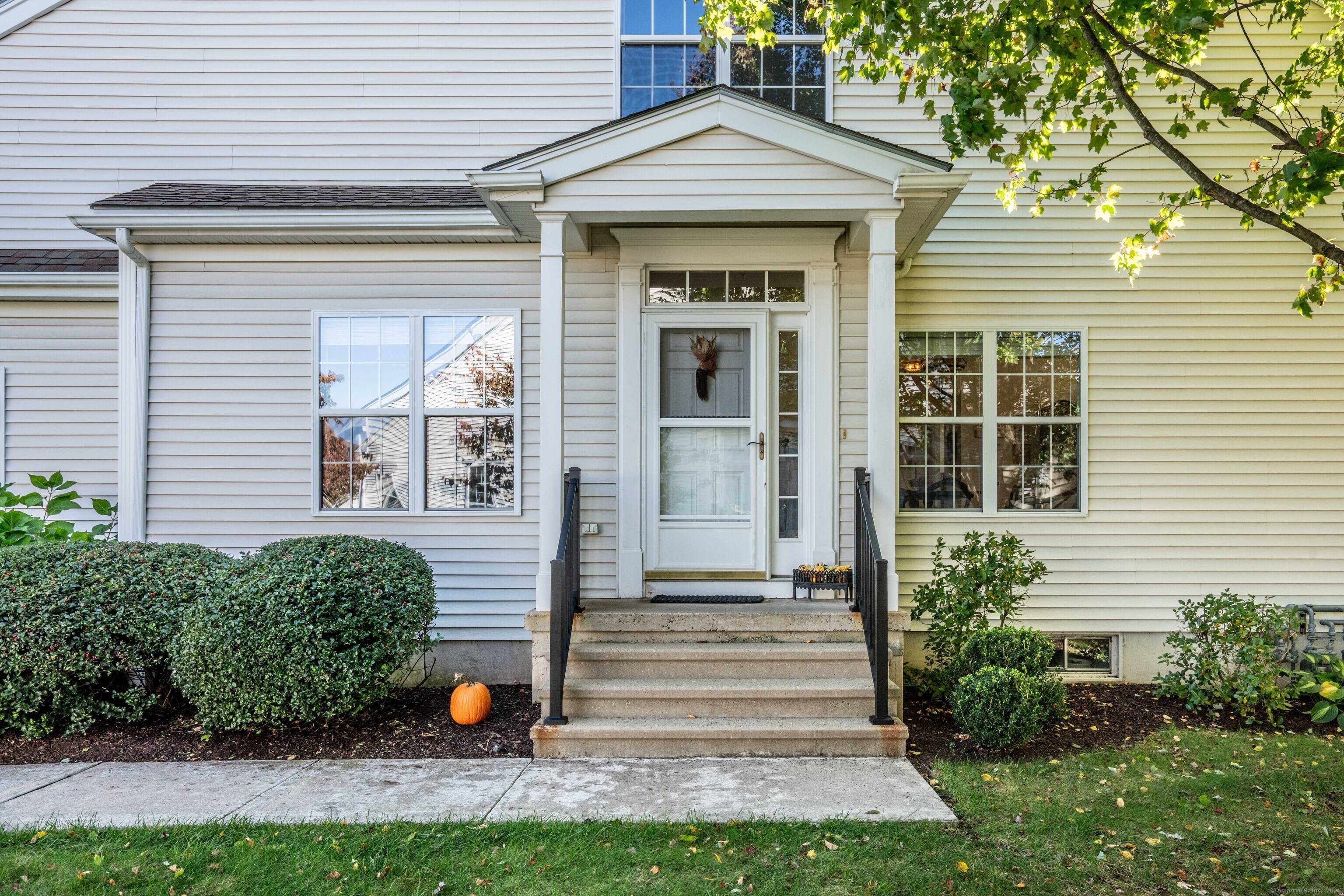 Discover the exceptional opportunity to own this meticulously maintained end unit condo in the highly sought after Oxbow Ridge 55 community.
