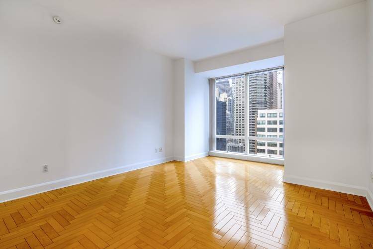 An elegant studio in Midtown s finest luxury condominium, 845 United Nations Plaza.