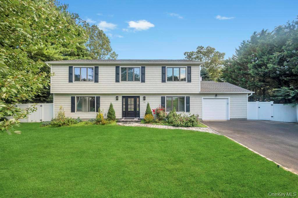 Welcome to this exquisitely renovated Colonial home situated in the highly sought after New Imperial Gardens of Dix Hills.
