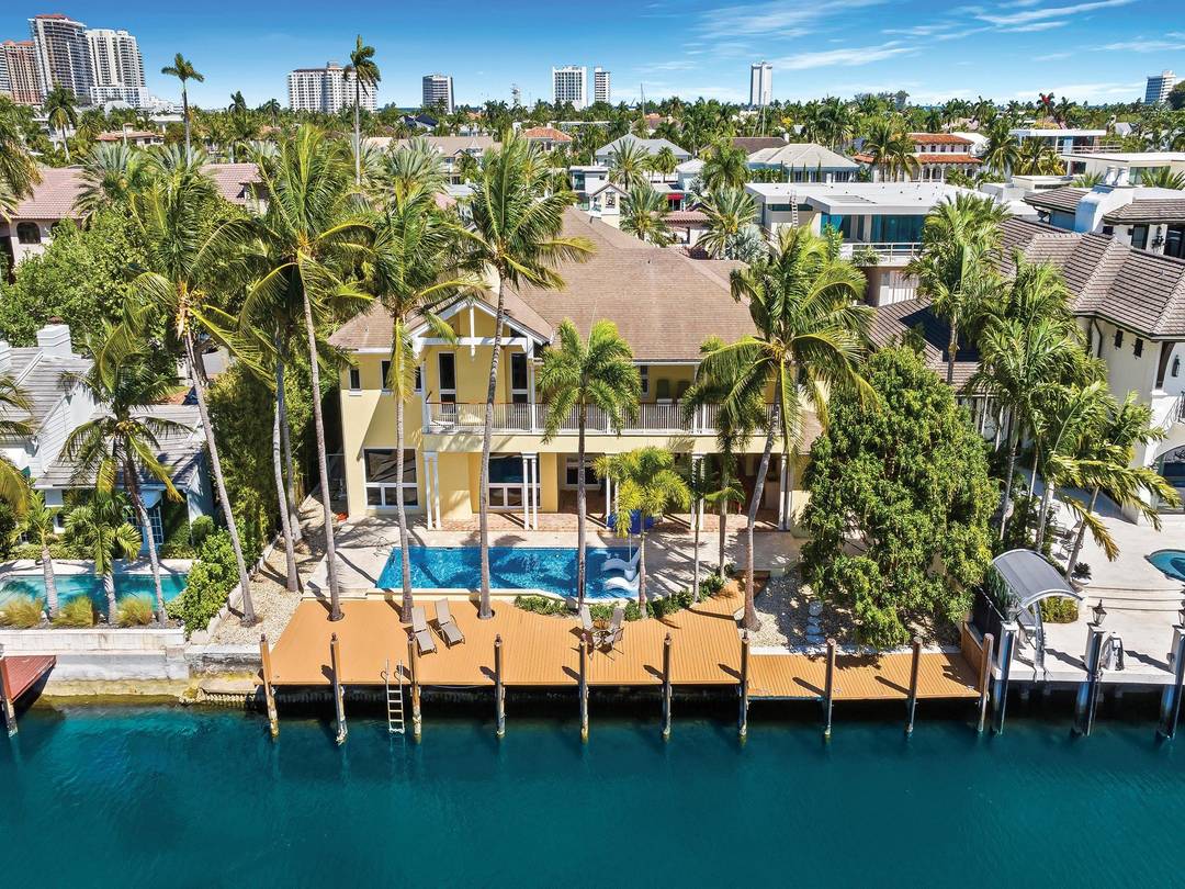 Luxury redefined in this transitional contemporary estate, situated in the southern waterways of the Las Olas Isles, boasting 100' of deep waterfront amp ; no fixed bridges to the ocean.