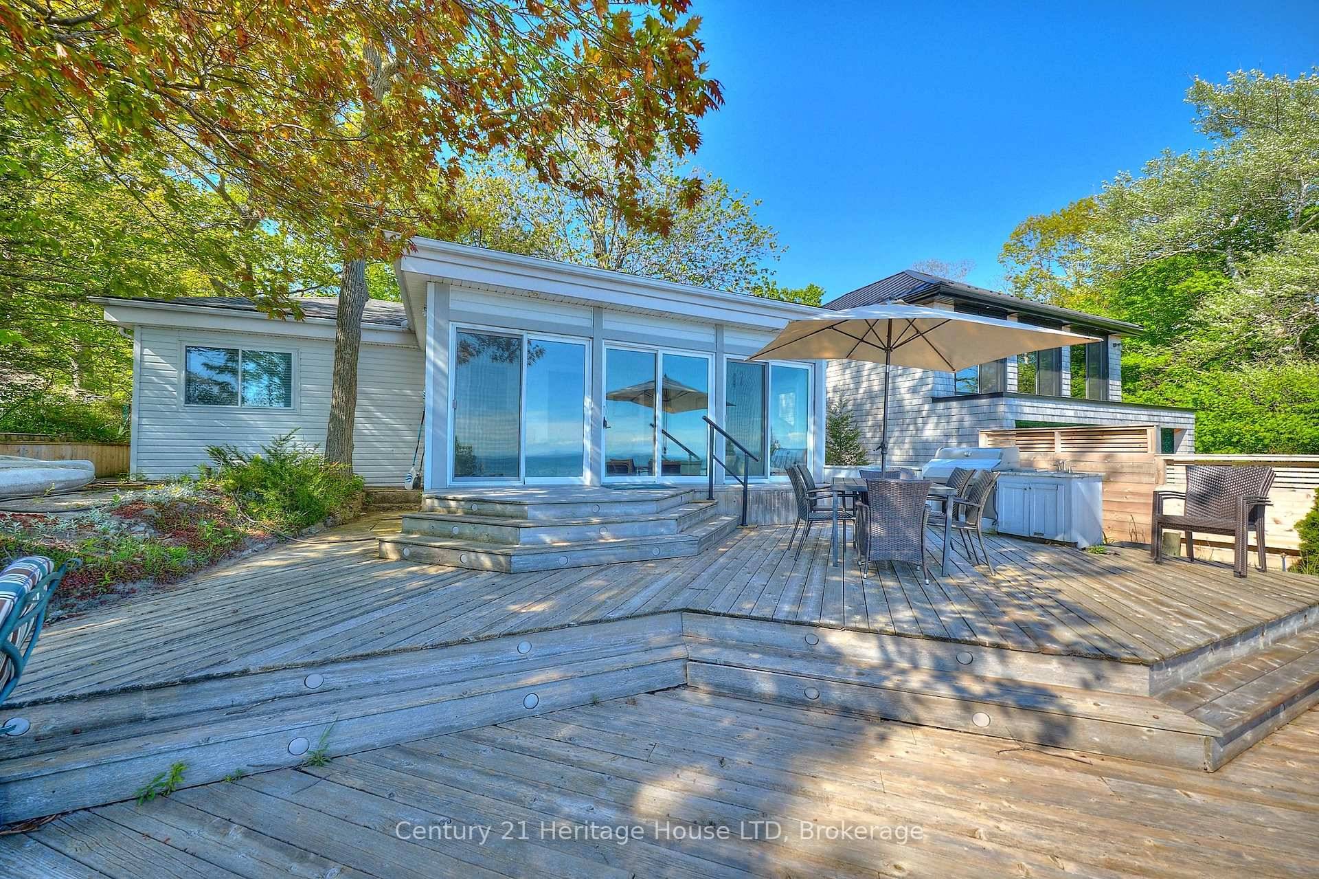 This charming bungalow at 2901 Vimy Road in Port Colborne offers a tranquil waterfront lifestyle with direct access to Lake Erie's sandy shoreline.