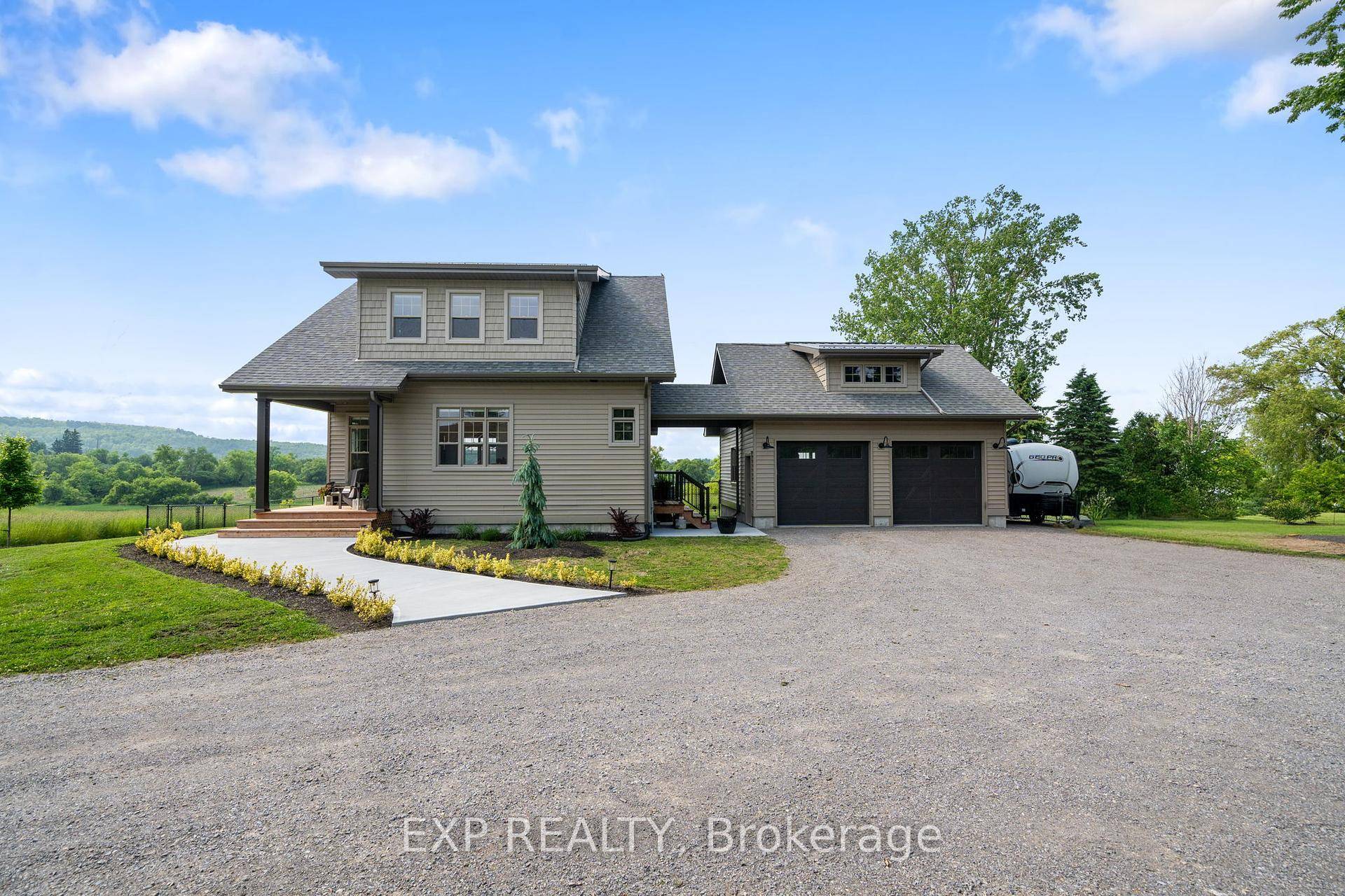 This stunning 2023 custom built home offers a perfect blend of modern comfort and serene country living.