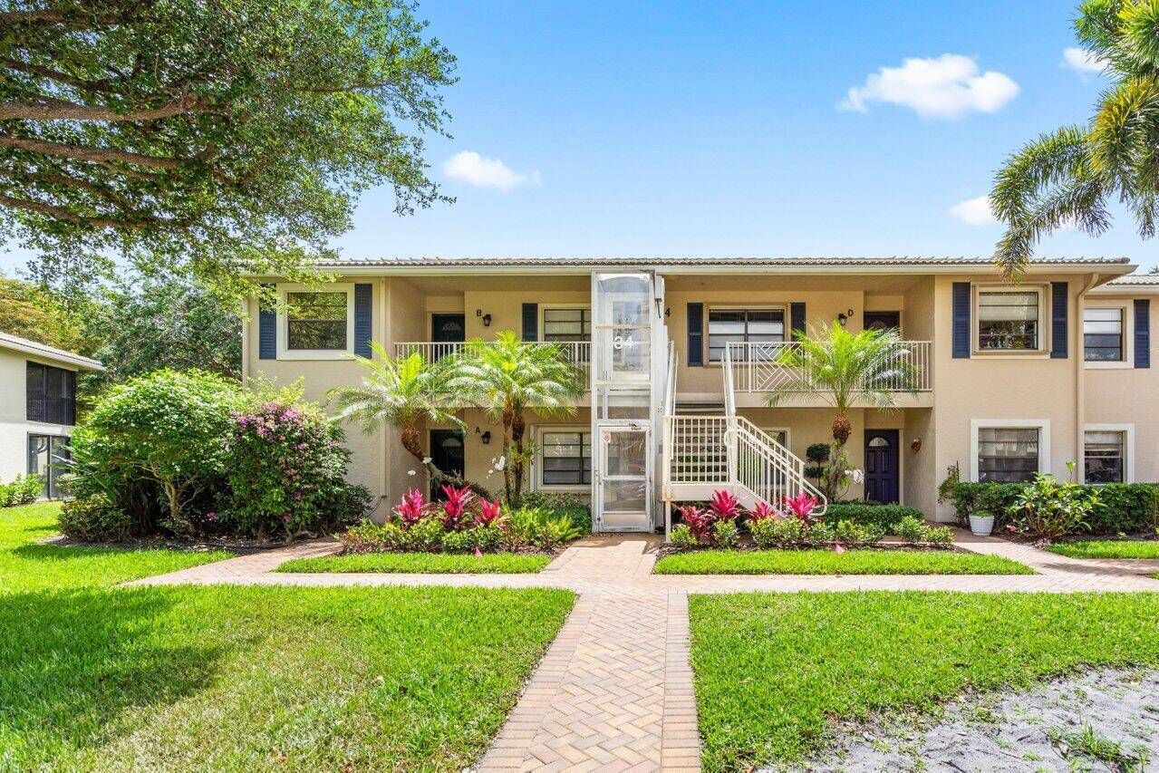 Beautifully renovated downstairs 2 bedroom 2 bath condo with lake and golf views.