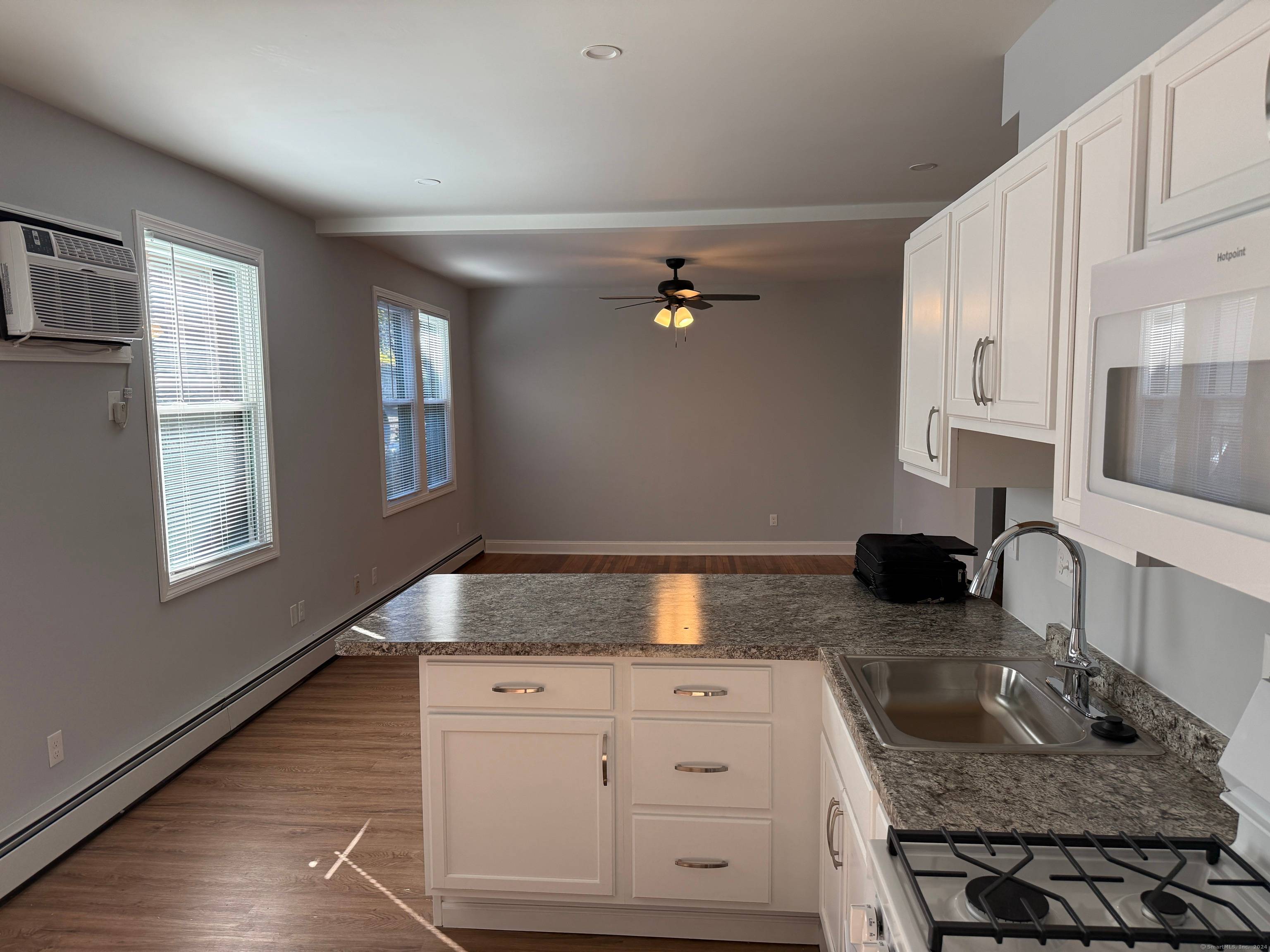 Totally remodeled 6 unit residential brick building with 6 bay brick garage.