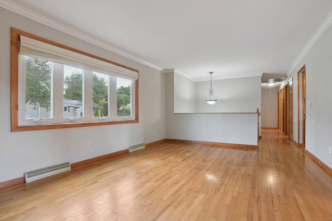 Welcome home to this beautifully updated 3 and possibly 4 bedroom, 2.