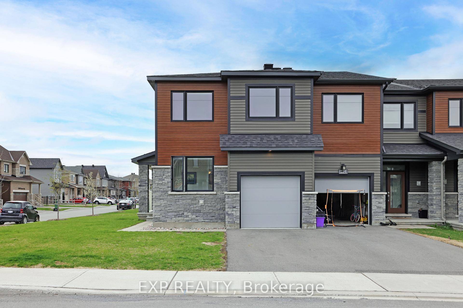 This 2022 built Spectacular 4 bedroom, 4 bath end unit executive townhome comes turnkey with numerous upgrades.