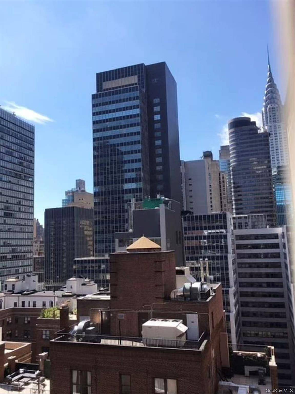 Residence 22C is south facing large one bedroom with bay windows.