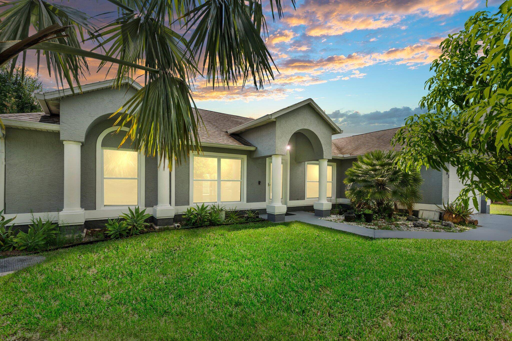 Discover this spacious and inviting 4 bedroom, 2 bath CBS home featuring a screened in pool, vaulted ceilings, all IMPACT WINDOWS, and a smart, flexible layout.