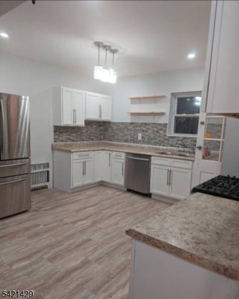 Great opportunity to own this well maintained two family home located on a quiet dead end street in East Orange.