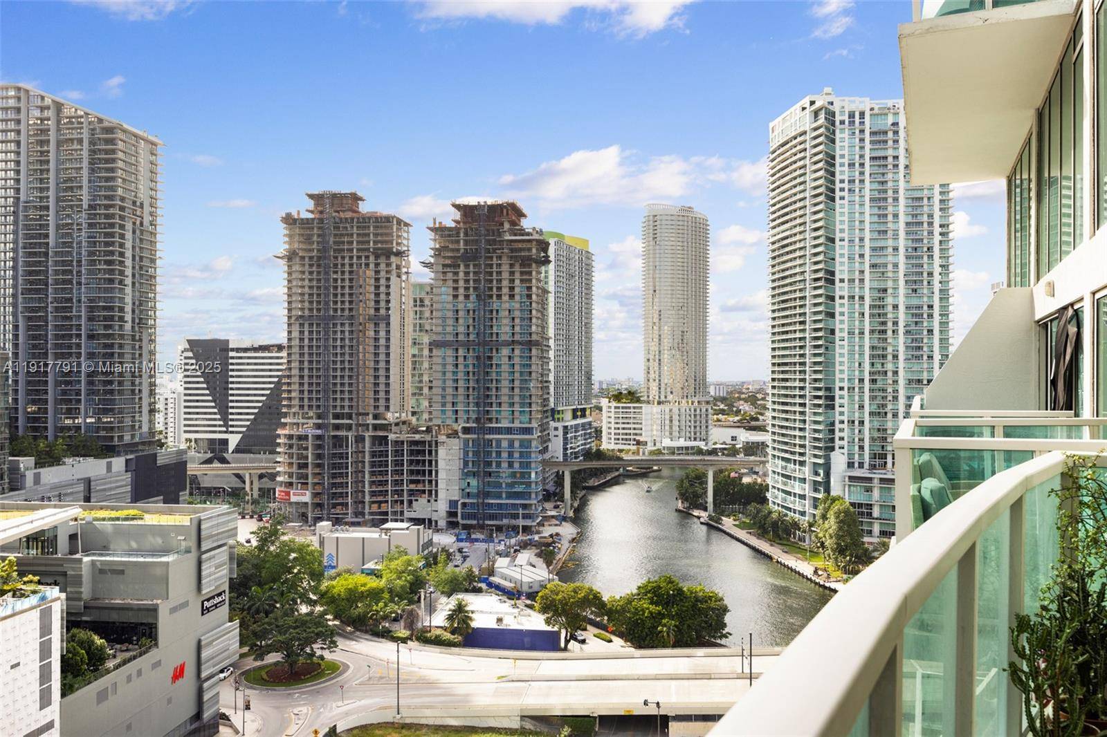 Enjoy panoramic river views from this loft style residence in the heart of Brickell.
