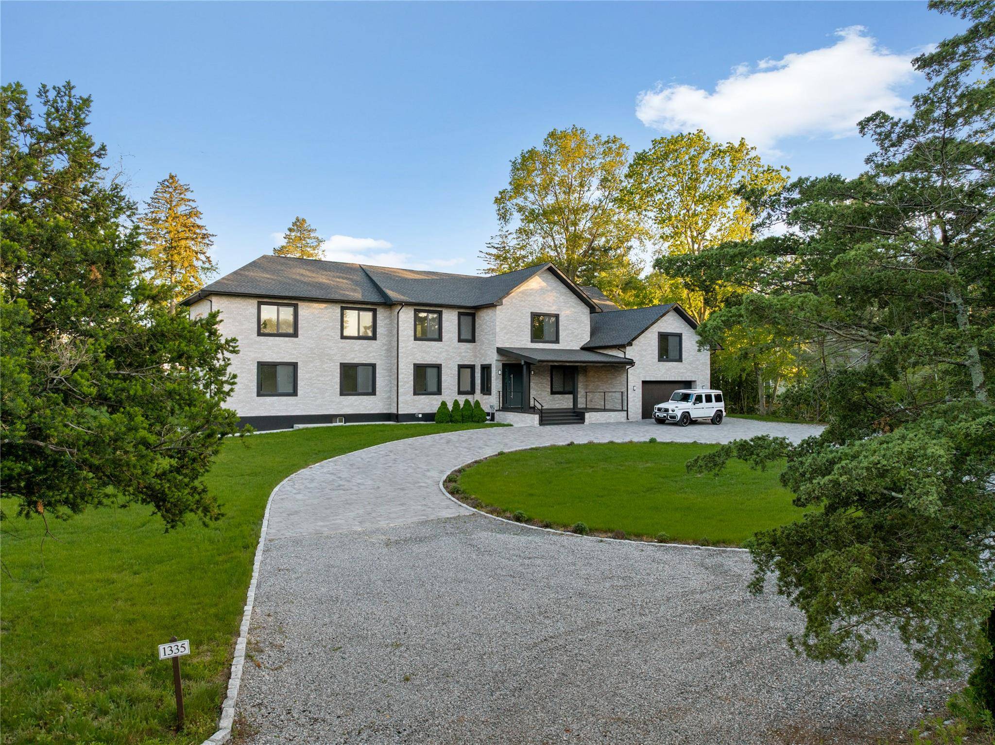 Welcome to 1335 Paine Road a rare opportunity to own a newly built, modern coastal style estate nestled at the end of a quiet, private road in coveted Hewlett Bay ...