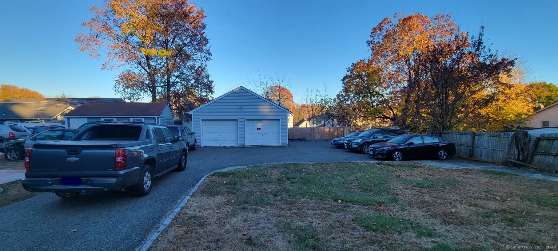 2 Family on level lot, in good condition, detached 2 car garage.
