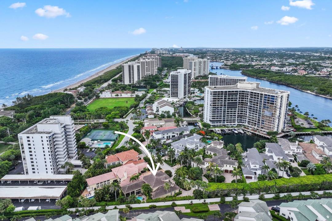 Hidden in the gated enclave of Grand Cay Estates, this exquisite single family home is nestled in the charming community of Boca Highlands.