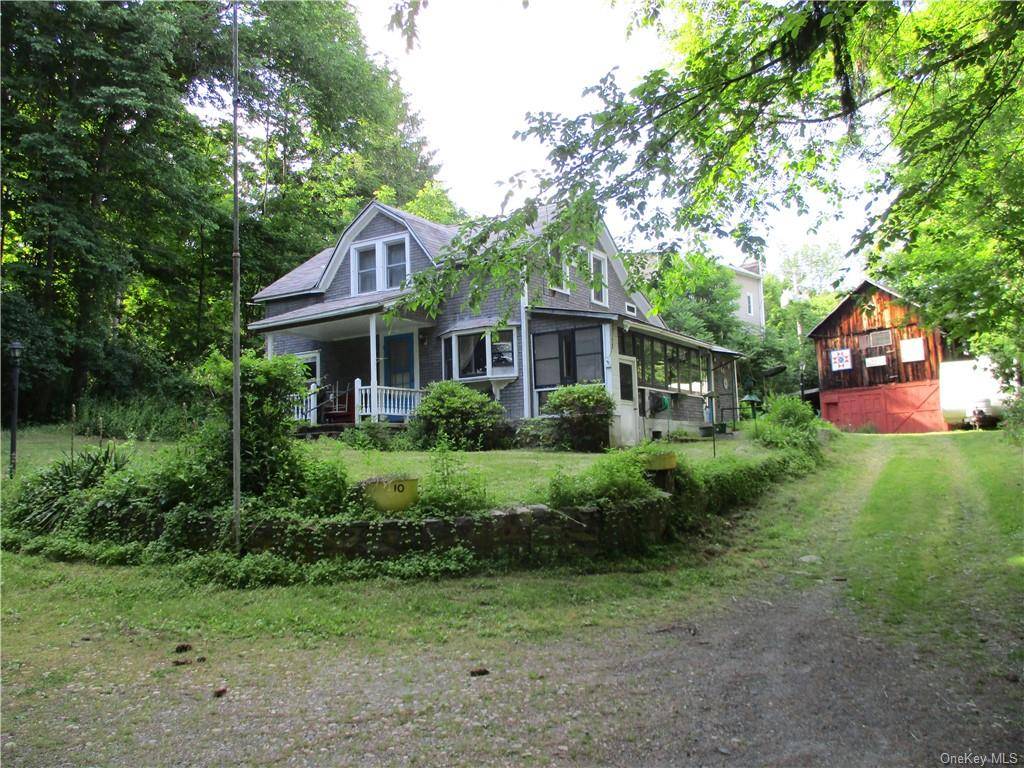 This 3 bedroom cape borders the D amp ; H Canal.