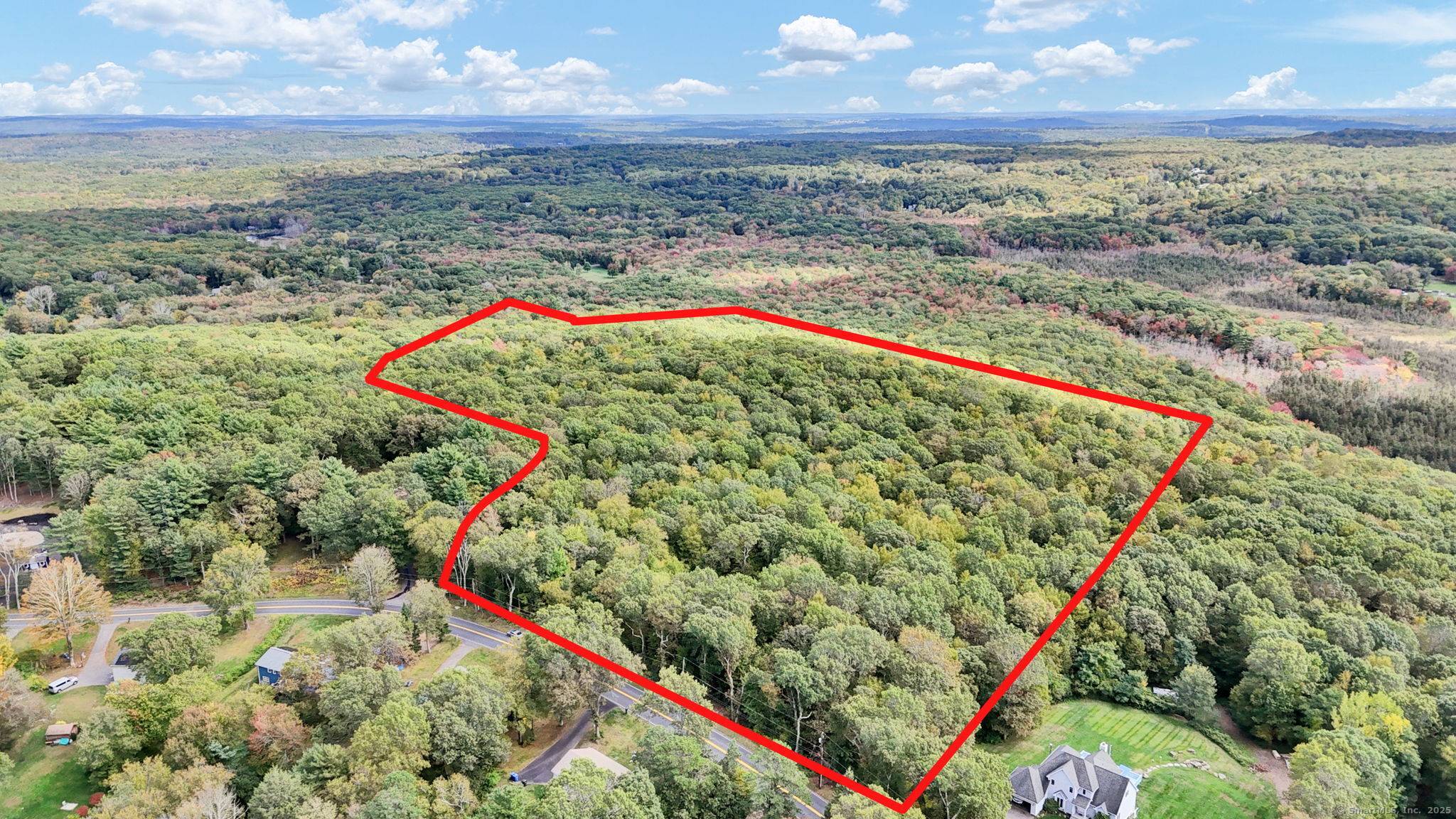 Discover your own slice of nature with this expansive 52 acre parcel in Tolland, offering endless opportunities for outdoor enjoyment.