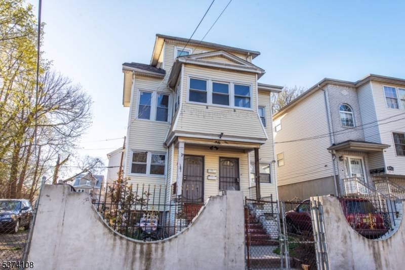 Back on the Market ! Spacious multi family property in the heart of Newark.