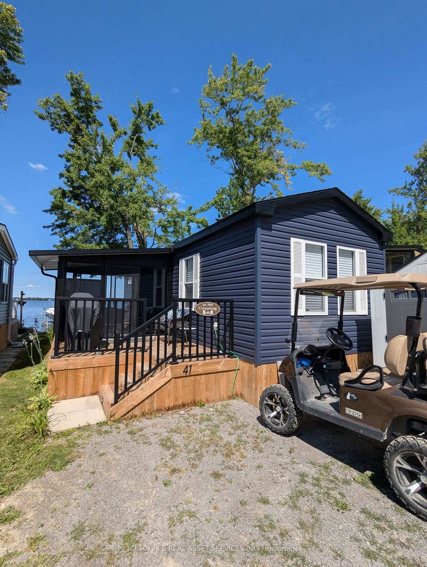 Enjoy spectacular lakefront living in this beautiful 3 bedroom, 1 bath Waverly Resort Cottage model.