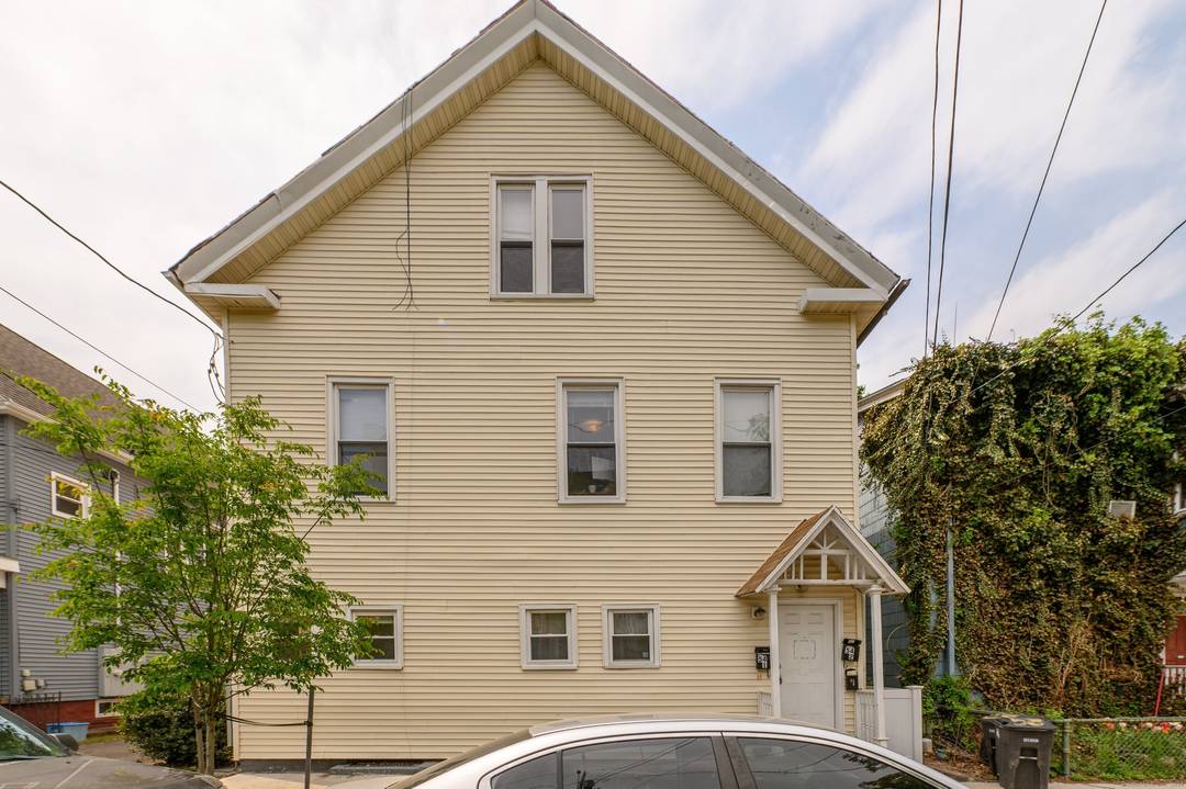 Spacious and wonderfully remodeled, 4 bedroom, 2 bathroom, second floor apartment in East Rock area of New Haven with off street parking.