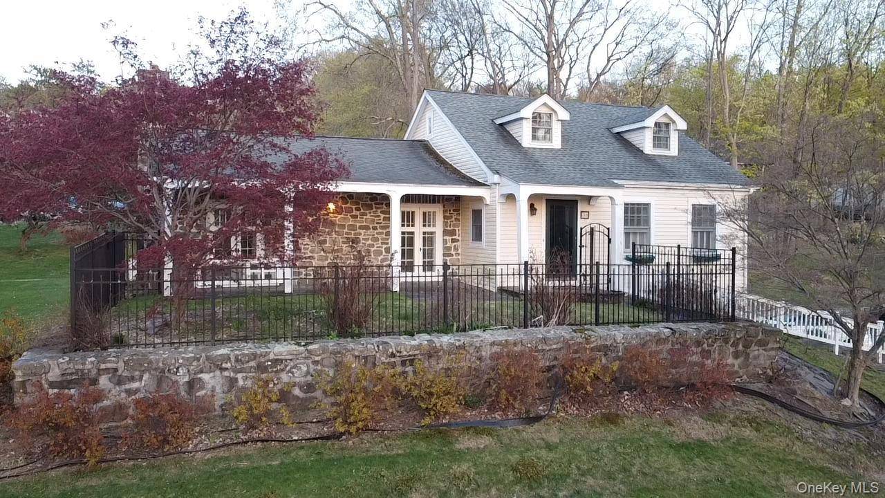 First time for sale in over 50 years, this charming Cape Cod style home is positioned on a spacious 0.