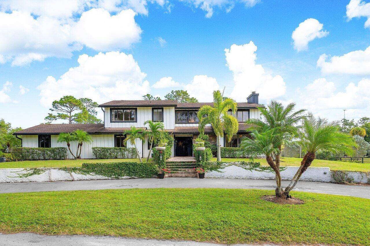 This remarkable property offers a serene 5 acre farm with a spacious and meticulously updated 5 bedroom, 3.