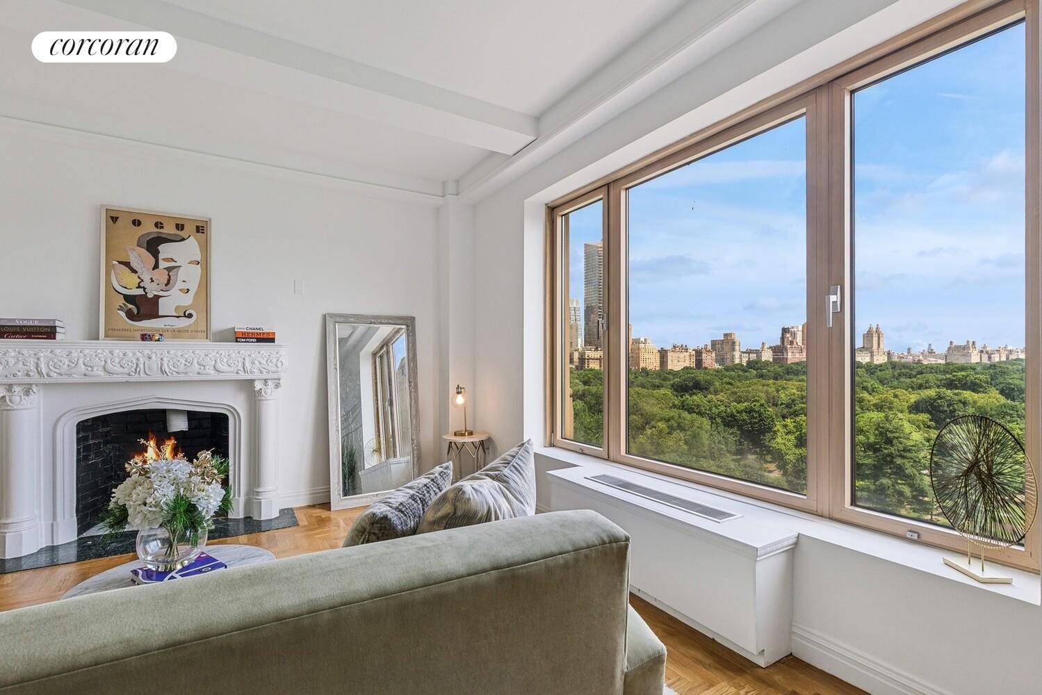 This stunning Central Park South residence offers sweeping, panoramic views of Central Park through picturesque oversized windows.