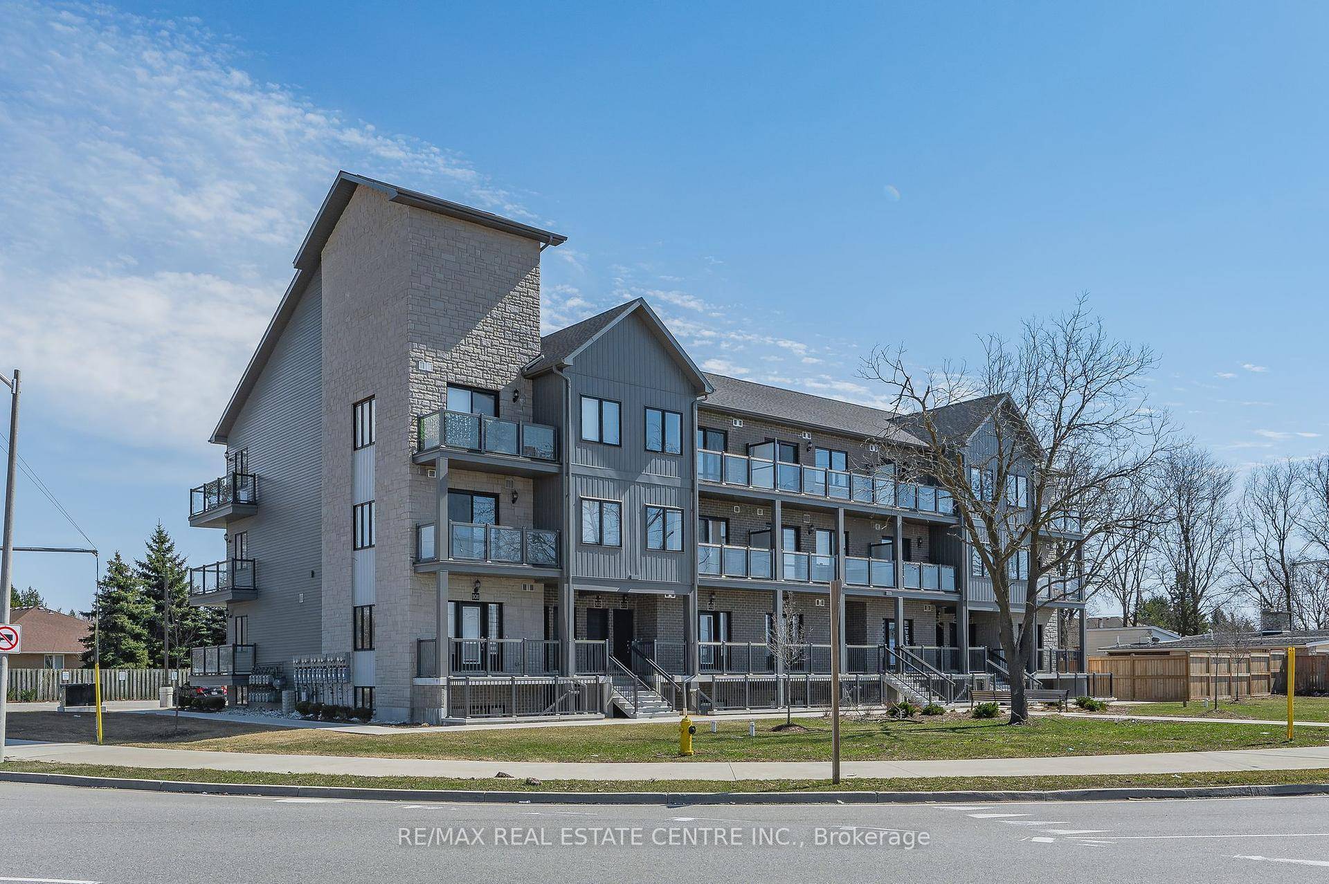 Step inside to discover a thoughtfully designed space featuring elegant quartz countertops, a spacious central island, stylish backsplash, and brand new appliances in the modern kitchen a true delight for ...