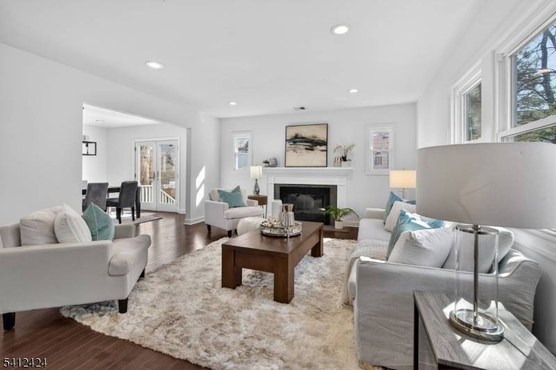 Stunning residence thoughtfully designed for modern living and timeless comfort in a fantastic Glenwood neighborhood just blocks from the Short Hills Train Station with direct service to midtown Manhattan.