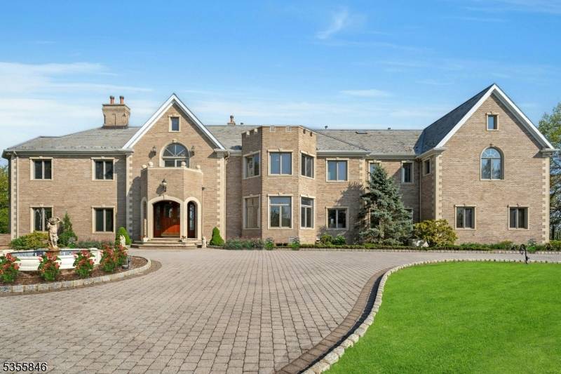 Experience luxury at its finest, enter by custom iron gates, this timeless country secluded estate offers every dream come true.