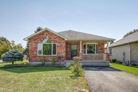 Welcome to 26 Sifton Drive, a charming brick bungalow on a quiet corner lot in the growing town of St.