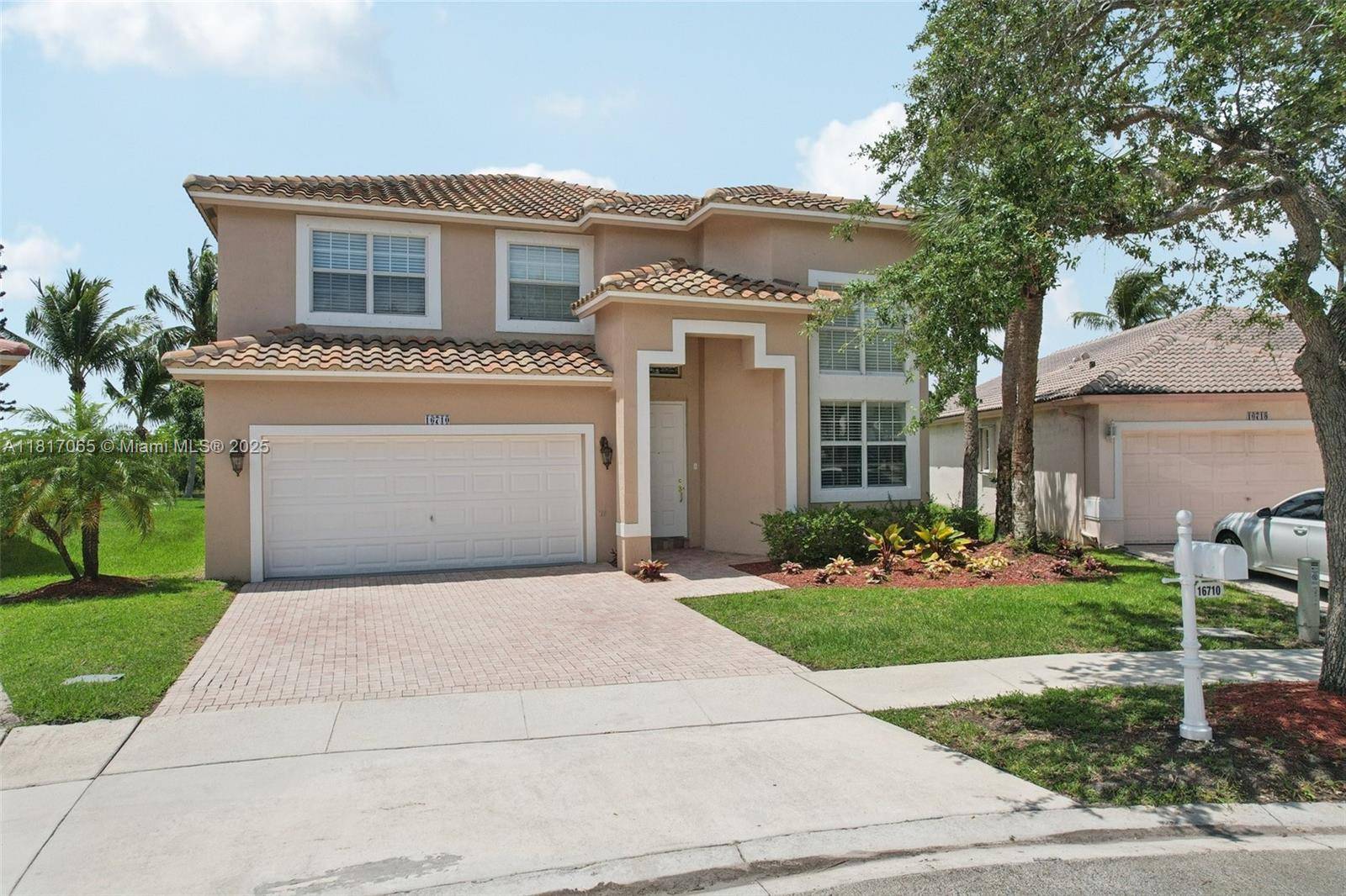 Meticulously maintained 4 bedroom, 3 bathroom home with a loft, perfectly situated on a breathtaking LAKEFRONT lot in the resort style community of Pembroke Isles.
