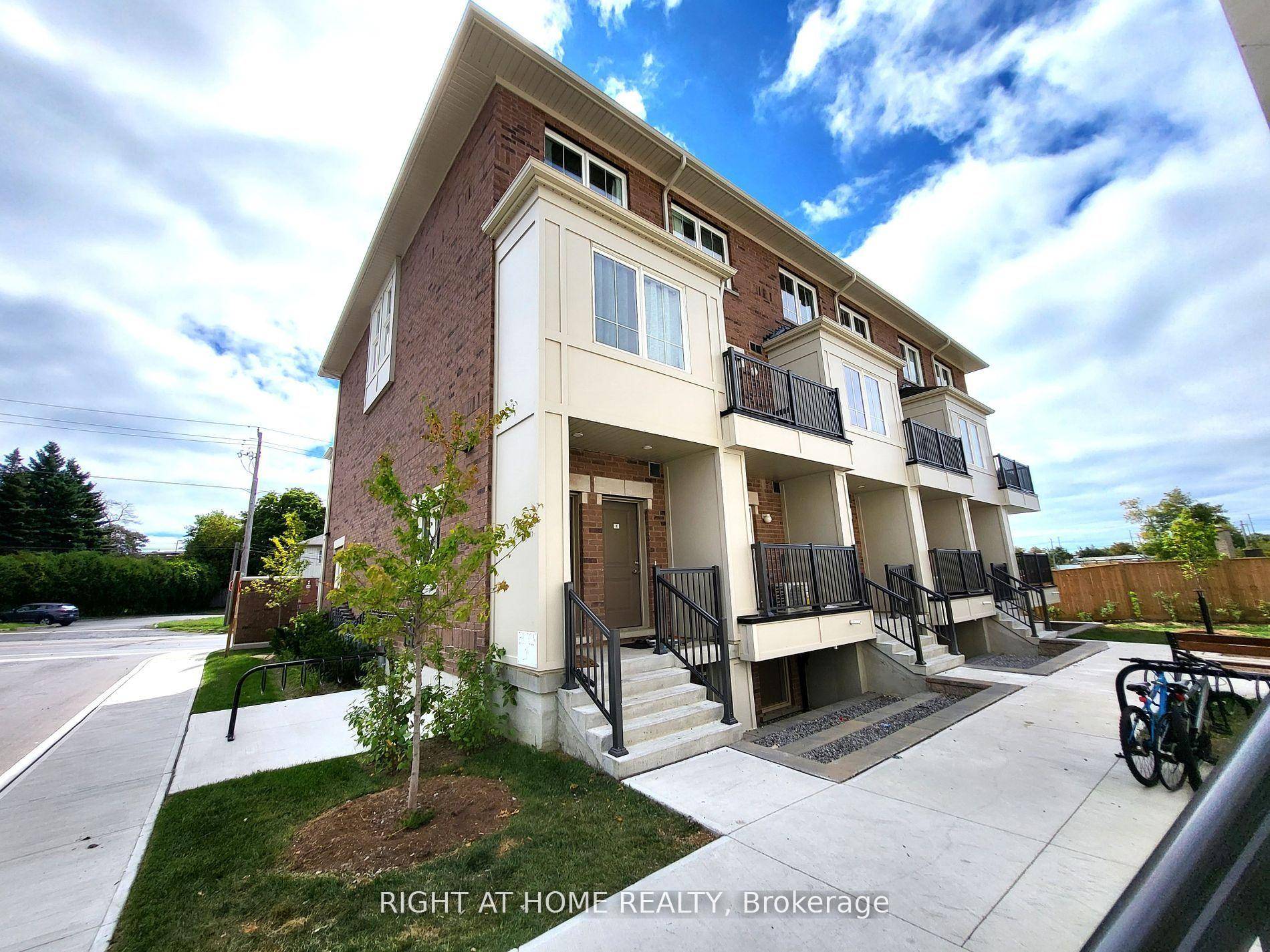Beautifully designed corner townhome featuring 2 spacious bedrooms and 1.
