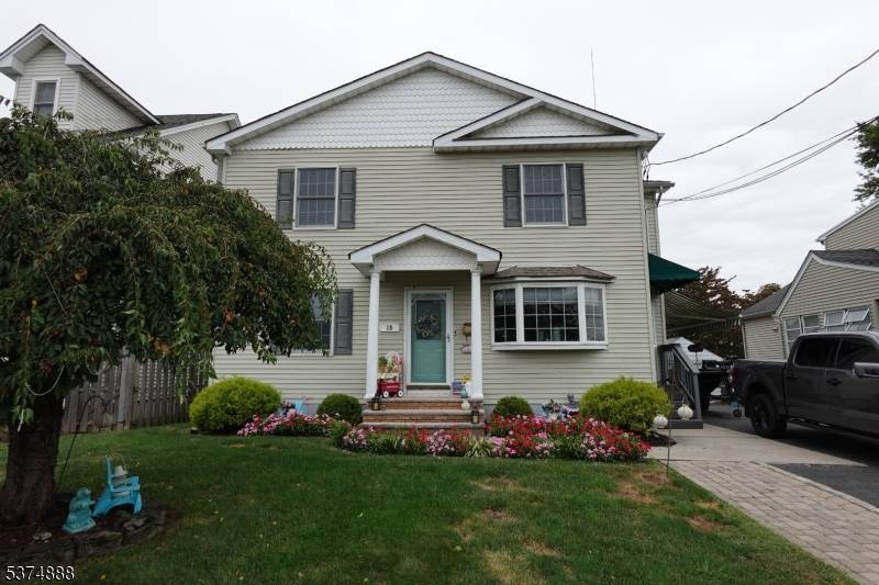 This charming colonial is settled on a quiet, dead end street.