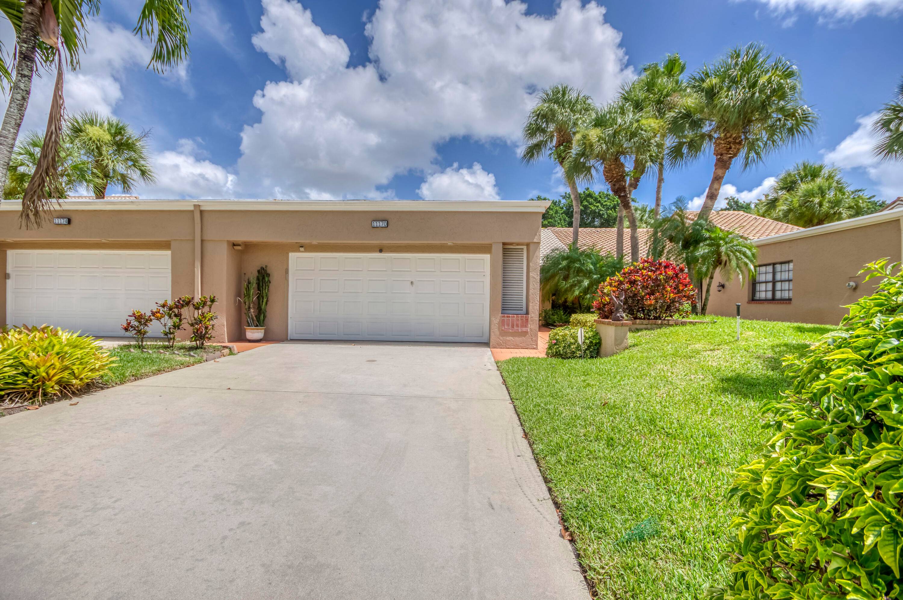 Charming 55 community villa in Applegate at Indian Springs featuring two master suites, open concept living area and a one car garage, and a stunning backyard view overlooking the golf ...