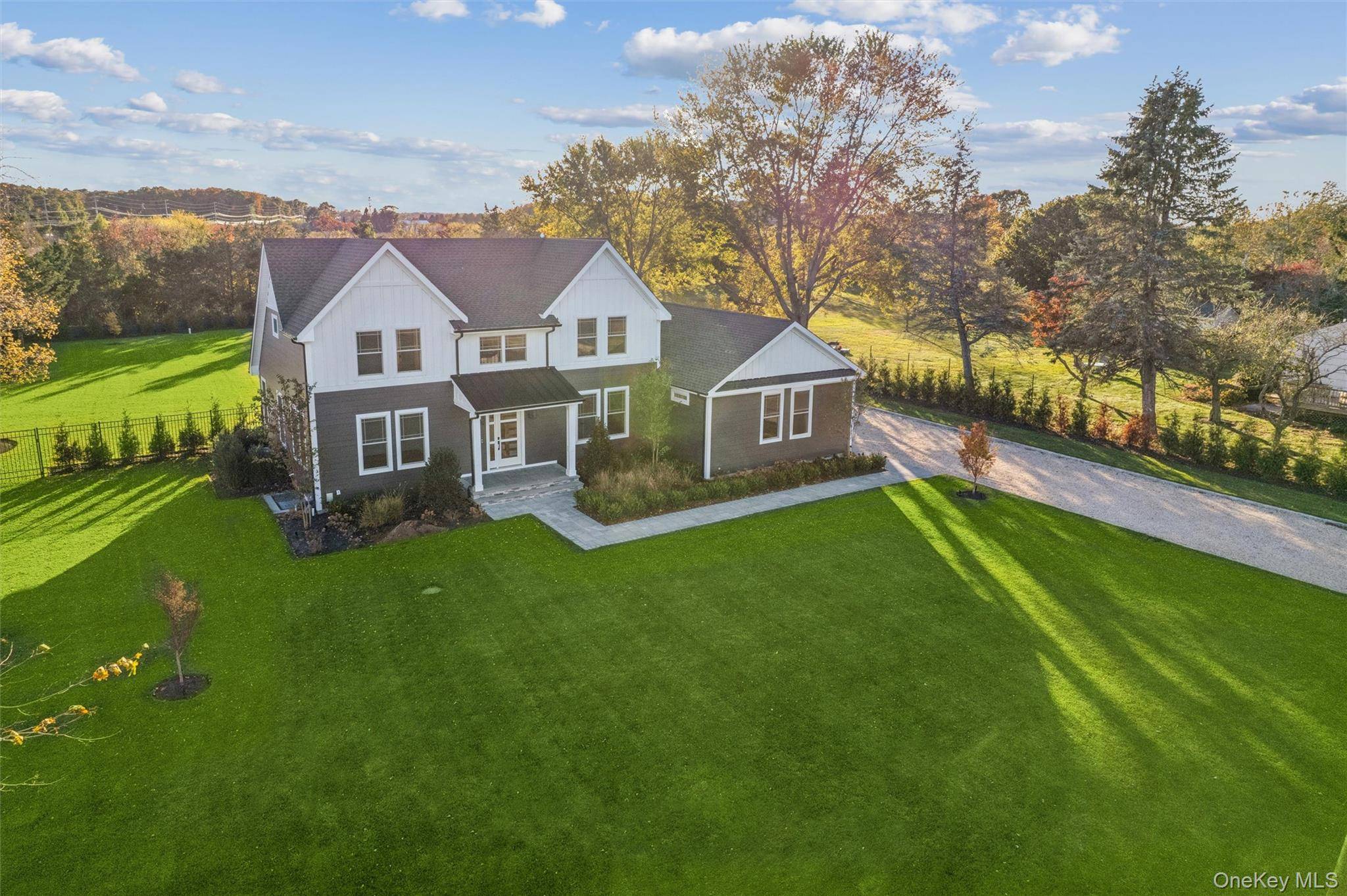Set against the backdrop of the stunning North Fork, this brand new luxury home in Cutchogue offers the perfect mix of sophisticated design and laid back coastal living.