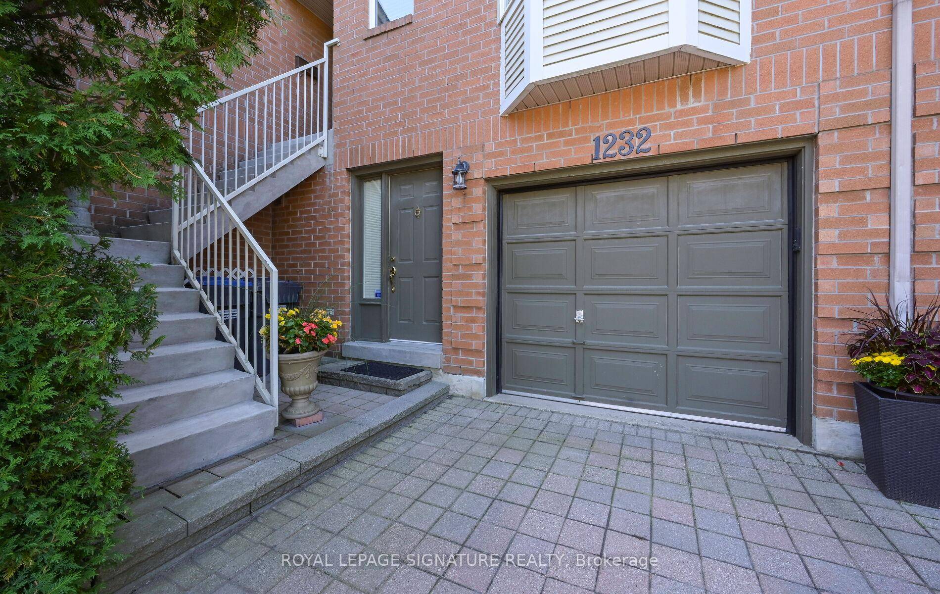 Absolutely Stunning Executive Townhome With 2 Entrances in a private enclave of Luxury Townhomes !