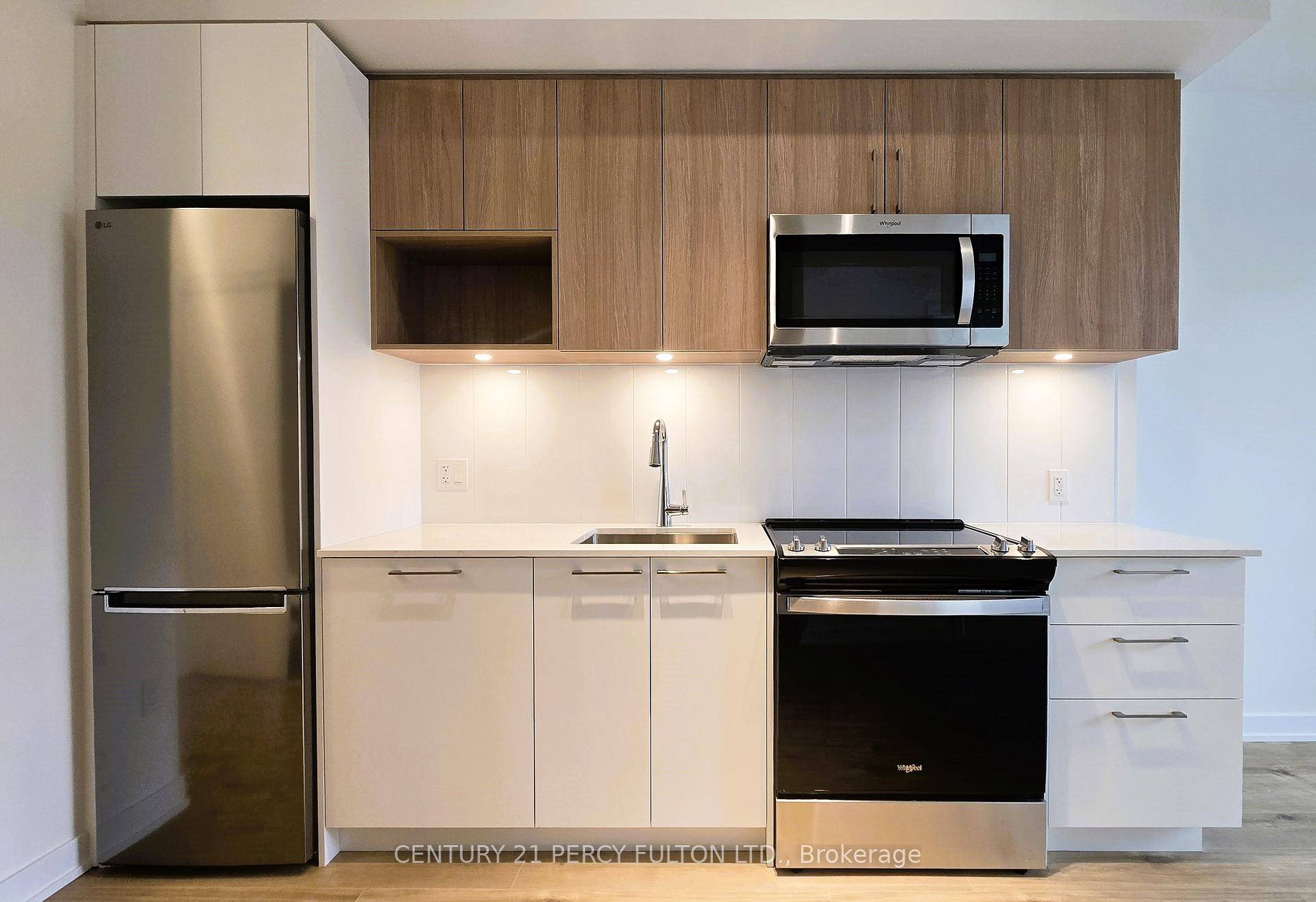 Fresh, bright, and move in ready brand new 1 Bed Den at Northshore with underground parking and locker.