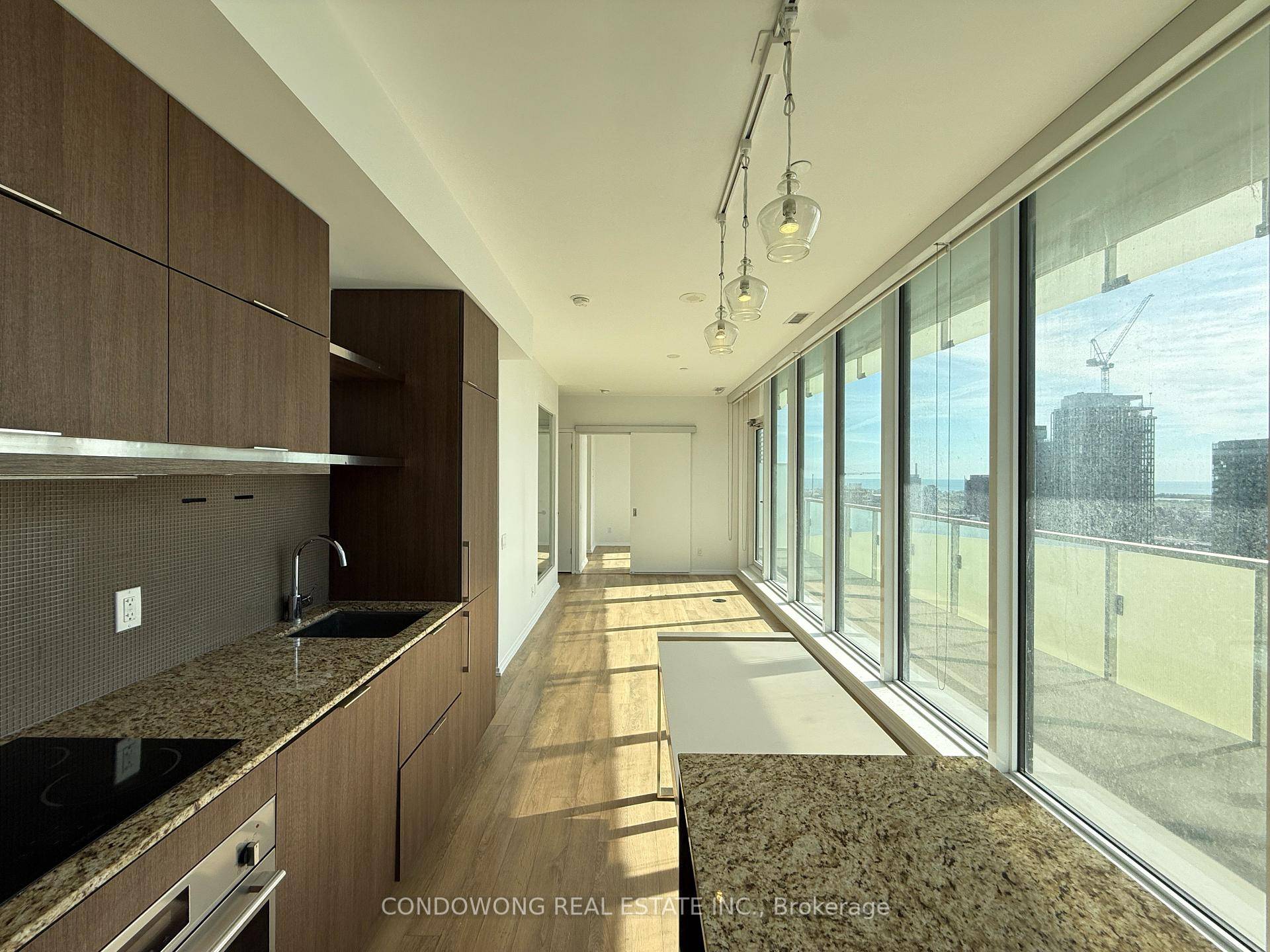 Step into a bright, freshly repainted 3 bedroom corner suite at the iconic Massey Tower.
