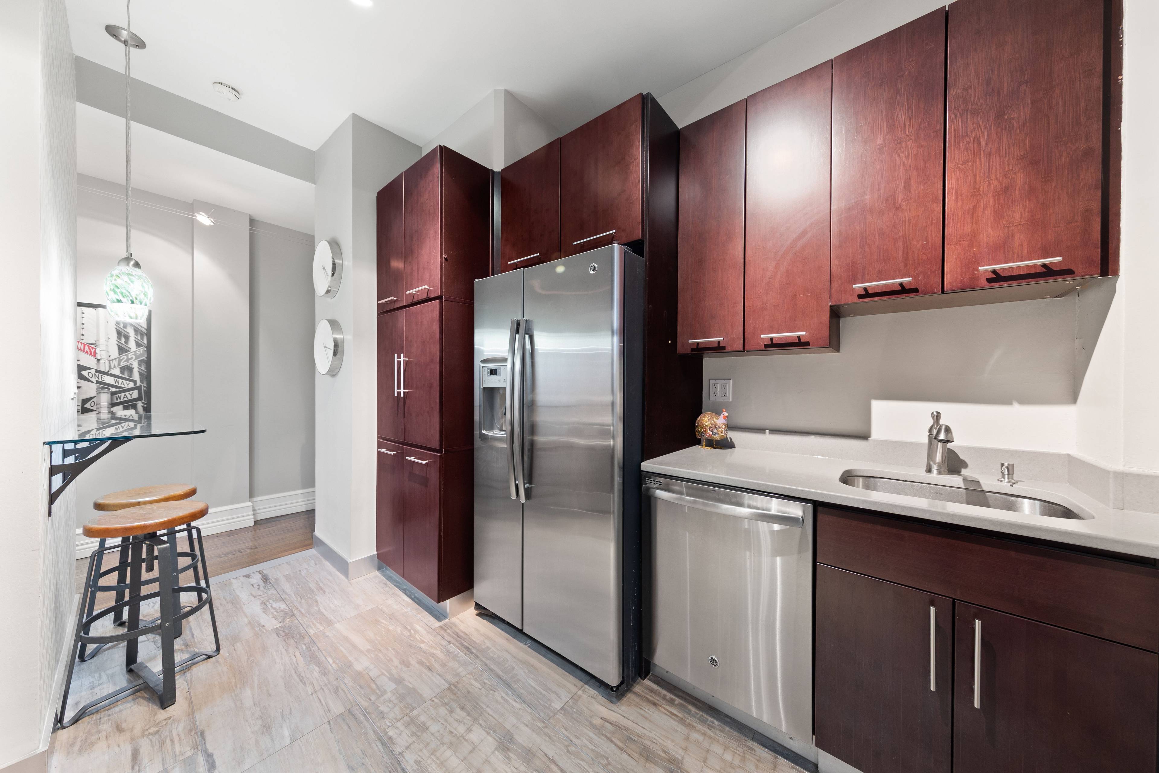 Apartment 6G at The Coronet Condominium is a stunning renovated two bedroom, one and a half bathroom that harmoniously blends prewar charm with modern luxury.