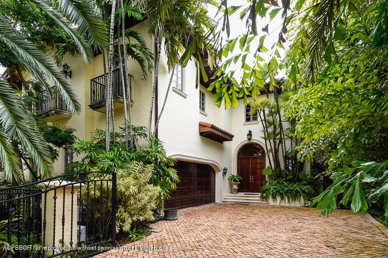 Beautiful Mediterranean in prime center of town lake block location literally steps to the town marina.