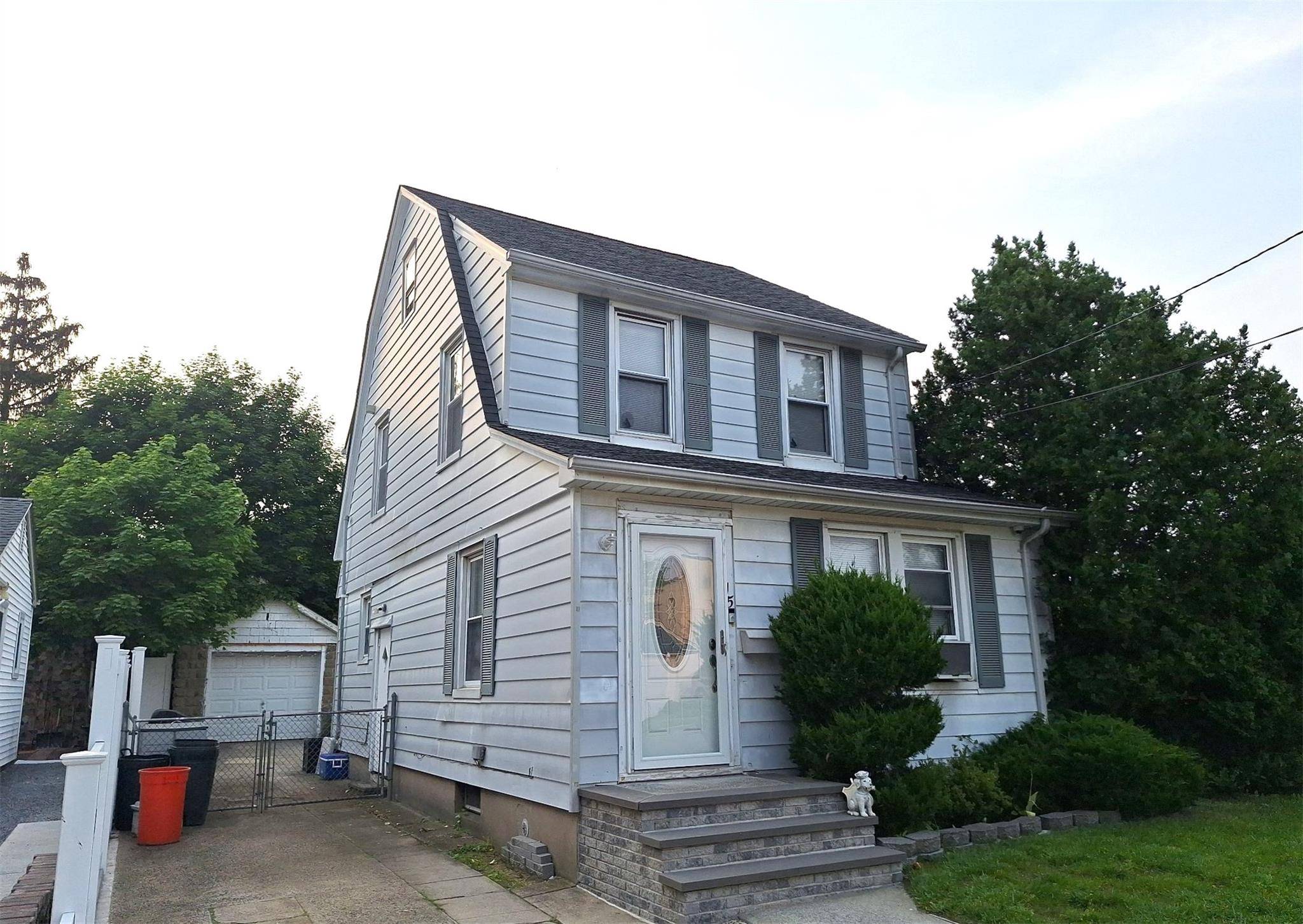 This Colonial Style Home Features 3 Bedrooms, 2 Full Baths, Formal Dining Room amp ; 1 Car Garage.