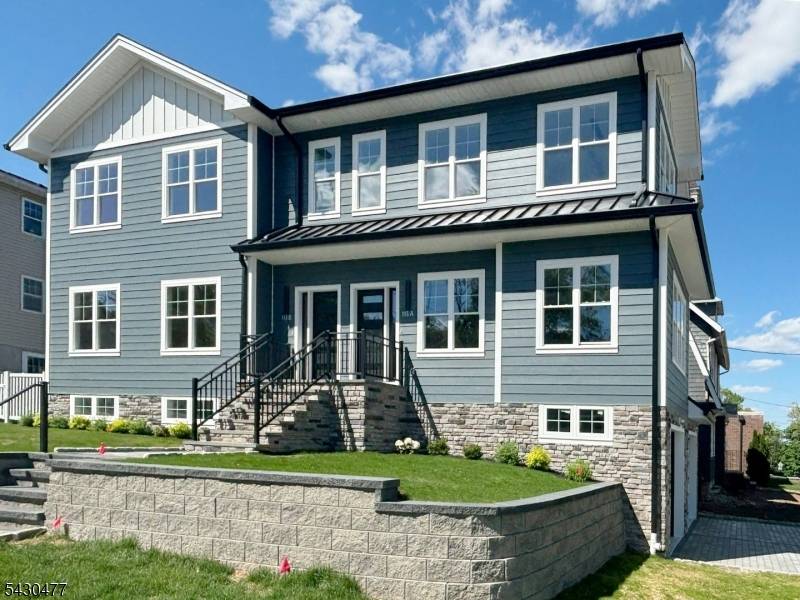 Brand new construction 2 family home with a 2 car built in garage.