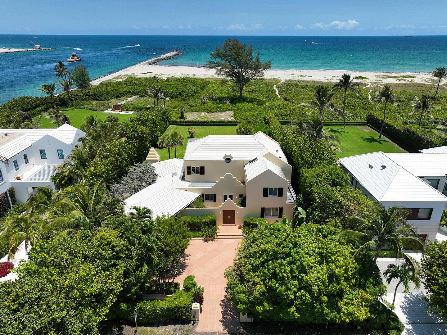 This rare, direct oceanfront property is situated on a 54, 000 SF lot with 100' of beach frontage.